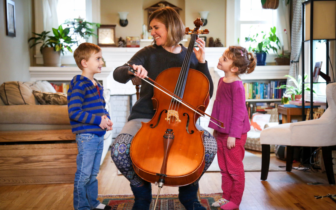Anna Yoder Schlabach and kids with cello